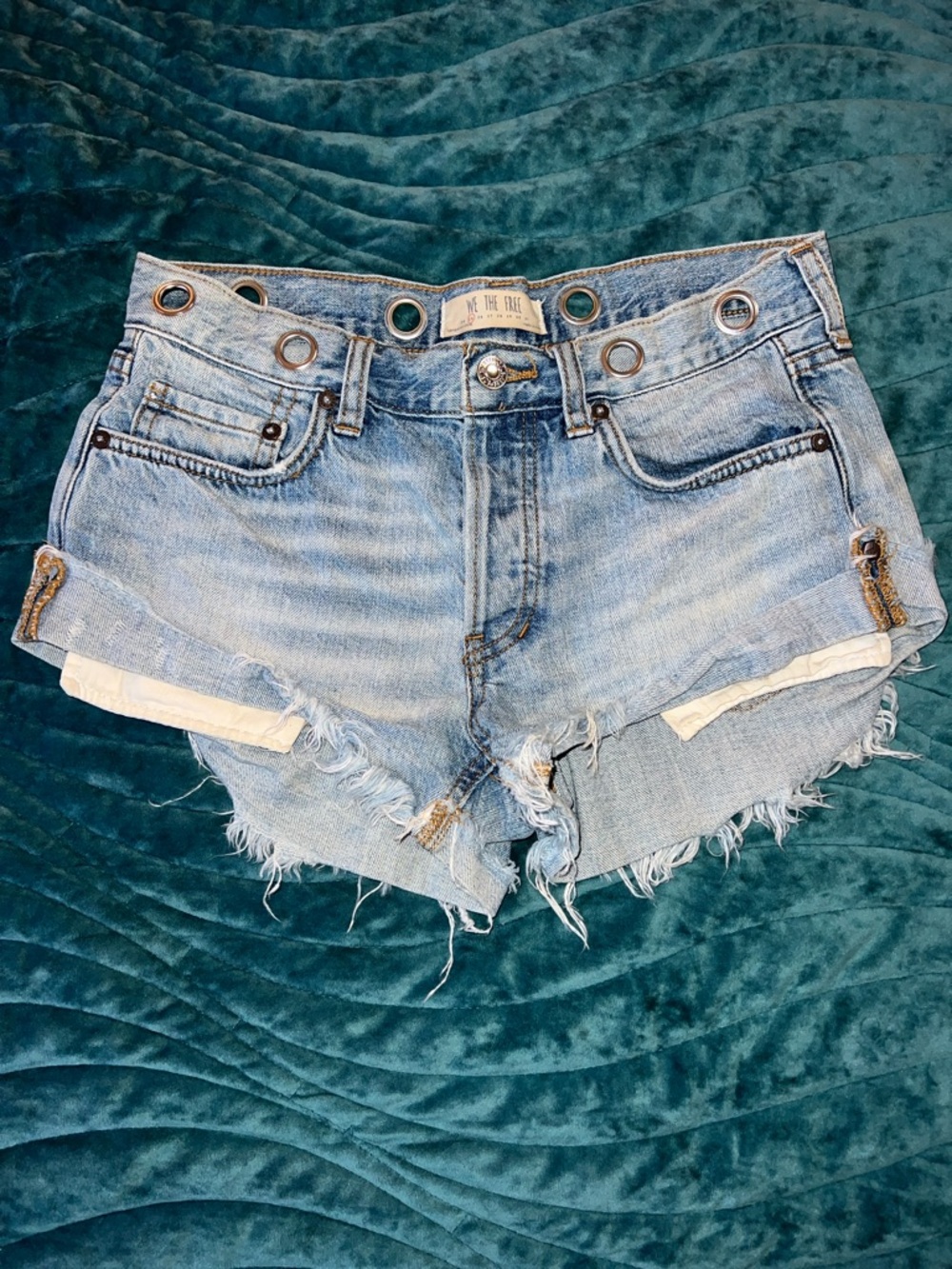 We The Free Faded Blue Distressed Denim Cutoff Shorts w metal loop detail